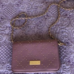 Purple Bebe pocketbook